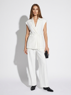 sleeveless white blazer